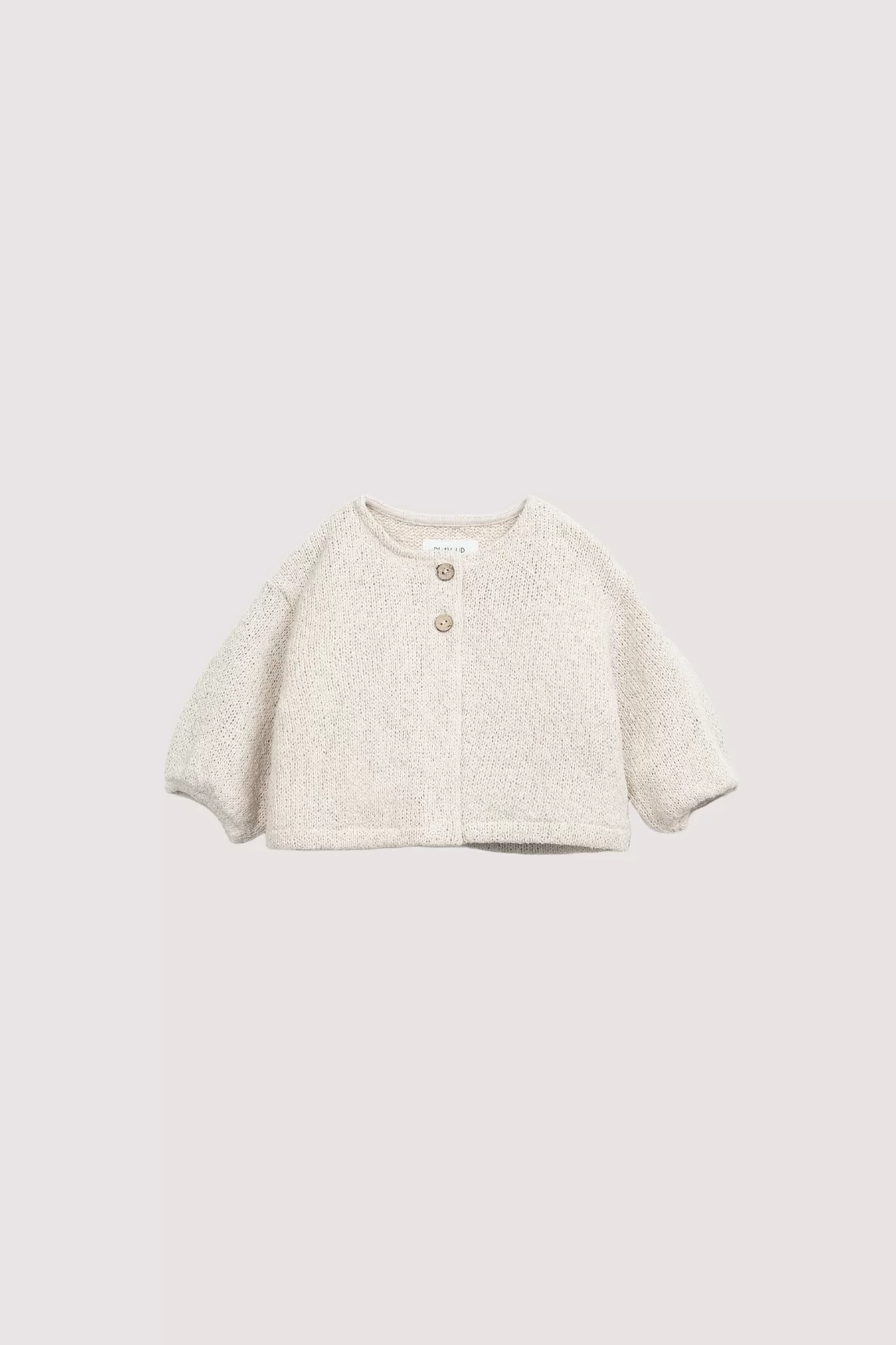 Creme baby vestje met houten knoopjes op de voorkant